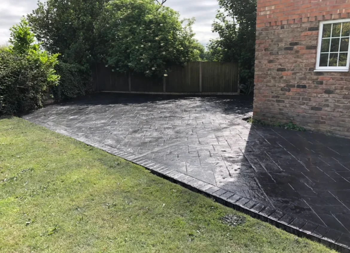 Patterned imprinted concrete driveway installation