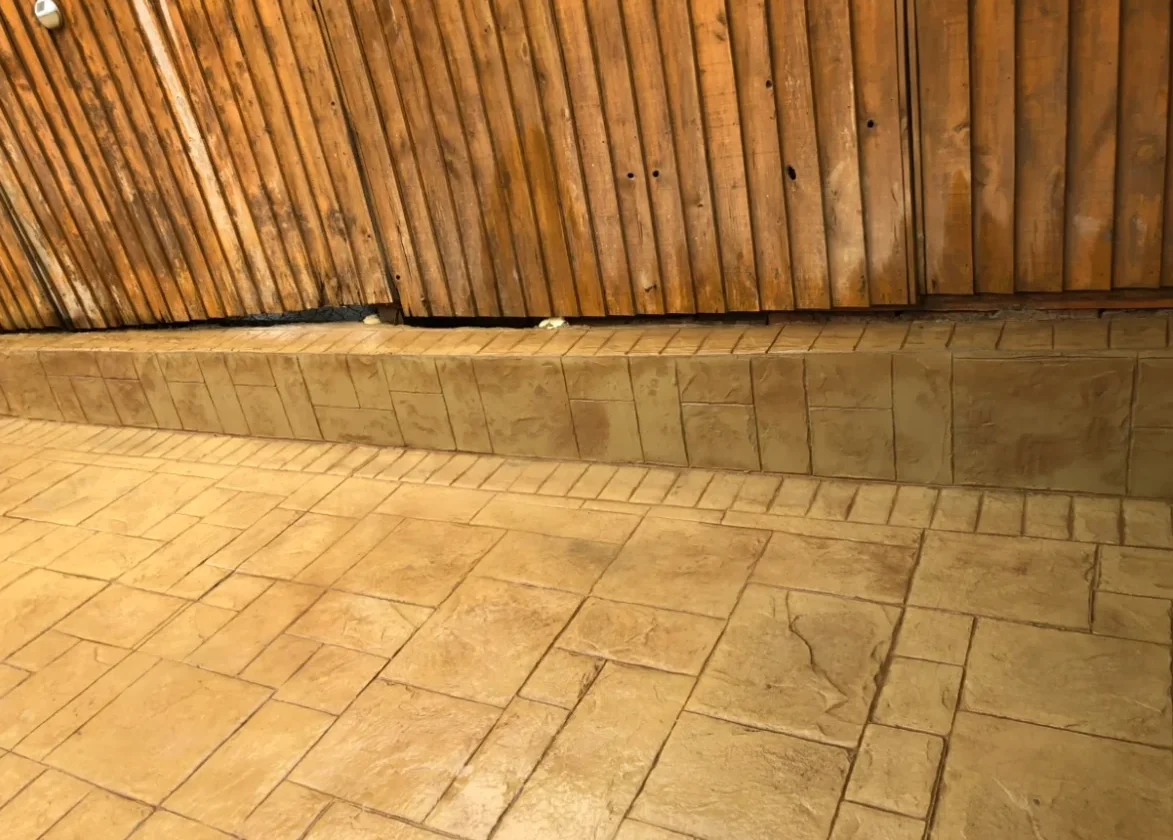 Stamped concrete patio with stone texture